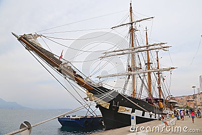 The three masted Palinuro, a historic Italian Navy training barquentine, moored in the Gaeta port. Editorial Stock Photo